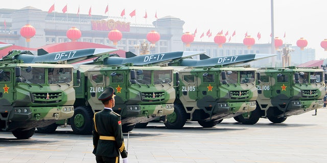 DF-17 Dongfeng medium-range ballistic missiles equipped with a DF-ZF hypersonic glide vehicle, involved in a military parade to mark the 70th anniversary of the Chinese People's Republic. 