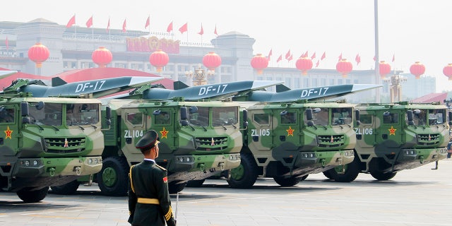 DF-17 Dongfeng medium-range ballistic missiles equipped with a DF-ZF hypersonic glide vehicle, involved in a military parade to mark the 70th anniversary of the Chinese People's Republic. 