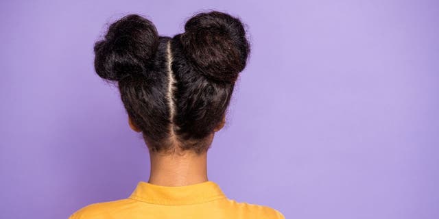 Search queries for 'space buns natural hair' were up 100% in 2021 and Pinterest believes the trend will continue to grow in 2022.