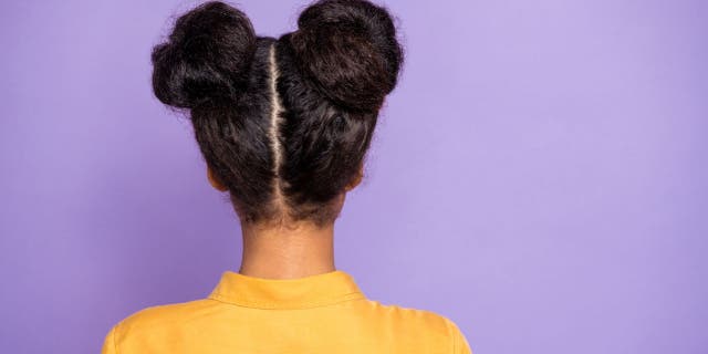 Search queries for 'space buns natural hair' were up 100% in 2021 and Pinterest believes the trend will continue to grow in 2022.