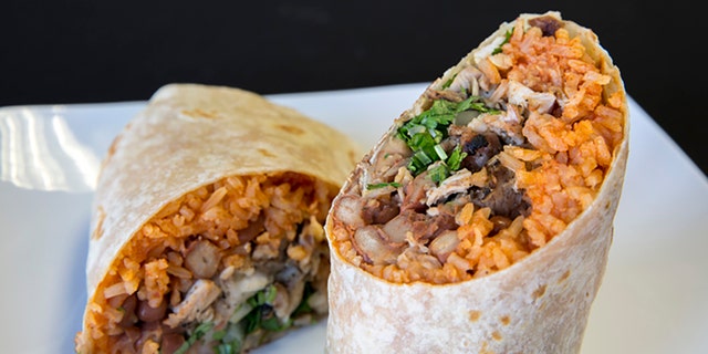 Burritos are a traditional Mexican dish that's typically made with a flour tortilla, meat, vegetables, cheese and other toppings, which are wrapped into a cylindrical shape.