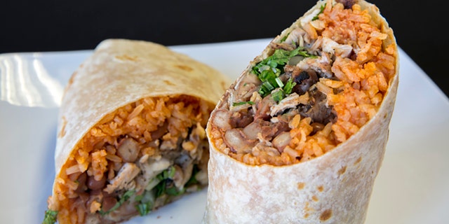 Burritos are a traditional Mexican dish that's typically made with a flour tortilla, meat, vegetables, cheese and other toppings, which are wrapped into a cylindrical shape.