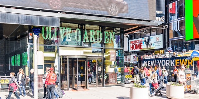 Olive Garden's prominent Times Square location was the scene of a vaccine mandate protest Friday night.