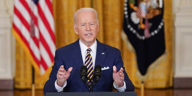 U.S. President Joe Biden holds a formal news conference in the East Room of the White House, in Washington, D.C., U.S., January 19, 2022. REUTERS/Kevin Lamarque