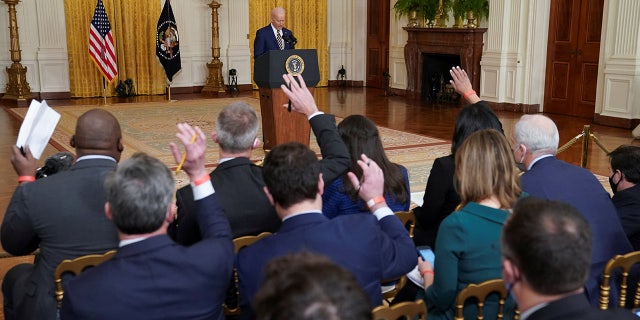 U.S. President Joe Biden holds a formal news conference in the East Room of the White House, in Washington, D.C., U.S., January 19, 2022. REUTERS/Kevin Lamarque