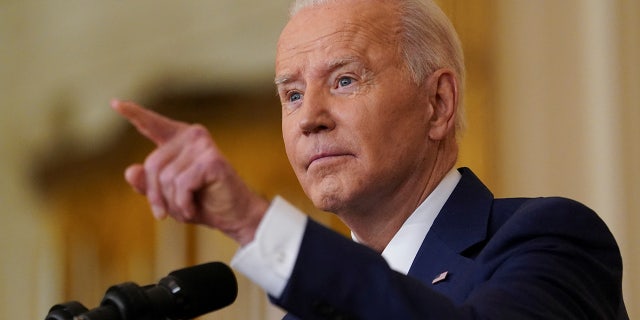 U.S. President Joe Biden holds a formal news conference in the East Room of the White House, in Washington, D.C., U.S., January 19, 2022. REUTERS/Kevin Lamarque