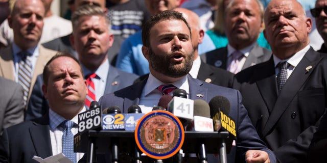 New York City councilor Joe Borelli, a Republican from Staten Island, speaks outside City Hall. (Photo by Drew Angerer / Getty Images)