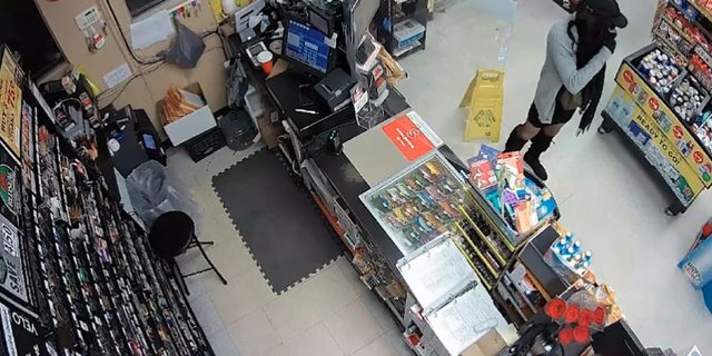 Graham, pictured above during the first armed robbery in DeBary, demanded cigarettes and cash from the clerk at gunpoint, authorities said.