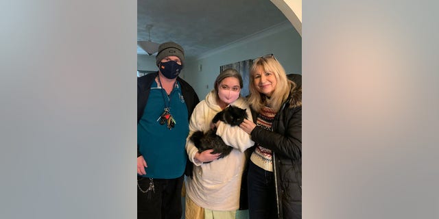 Millie, a 2-year-old pet cat, was reunited with her family after disappearing last June.