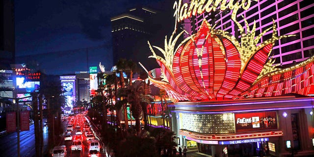 Motorists slowly move along Las Vegas Boulevard on New Year's Eve, Friday, Dec. 31, 2021, in Las Vegas. (Chitose Suzuki/Las Vegas Review-Journal via AP)