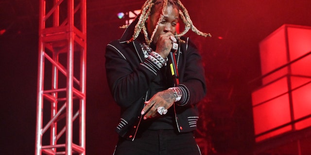 Lil Durk performs at Lil Baby &amp; Friends in Concert at State Farm Arena on December 12, 2021 in Atlanta, Georgia.