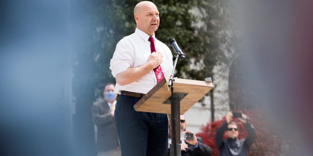 State Sen. Doug Mastriano speaks at a protest against the extended stay-at-home order.