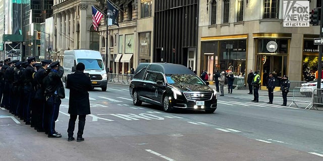 Hundreds of police officers waited outside the Midtown church and held a moment of silence as Rivera's casket was carried inside.