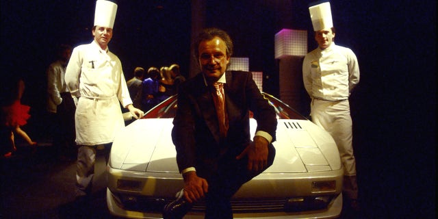 Giorgio Moroder financially backed the car and accompanied it on the auto show circuit.