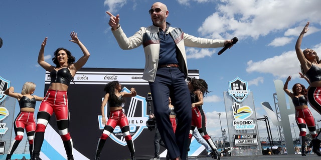 Rapper Pitbull co-owns the Trackhouse Racing team and has performed at NASCAR events.