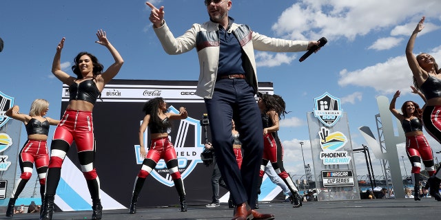 Rapper Pitbull co-owns the Trackhouse Racing team and has performed at NASCAR events.