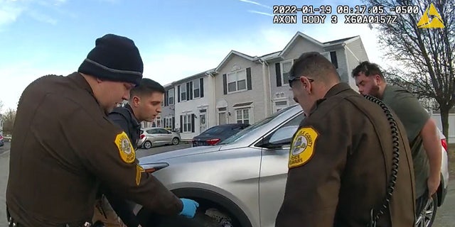 New Castle County police and a good Samaritan quickly decide how best to rescue the woman.