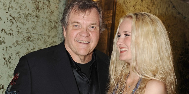 Singers Meat Loaf and his daughter Pearl Aday backstage at The Wiltern on June 27, 2012, in Los Angeles, California.  