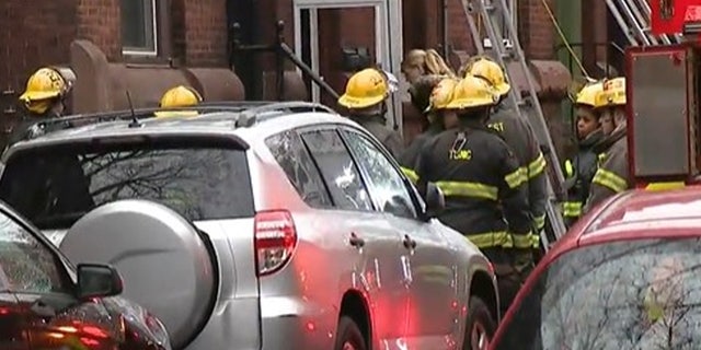Philadelphia firefighters respond to the scene Wednesday morning.