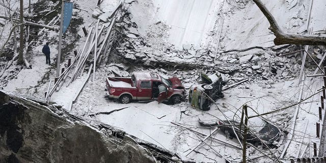 Vehicles that were on a bridge when it collapsed.