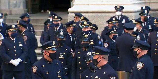NYPD Officer Jason Rivera’s casket was transported to St. Patrick’s Cathedral for his wake. 