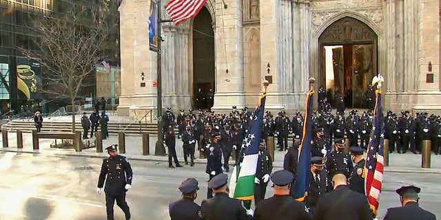 NYPD Officer Jason Rivera’s casket was transported to St. Patrick’s Cathedral for his wake. 