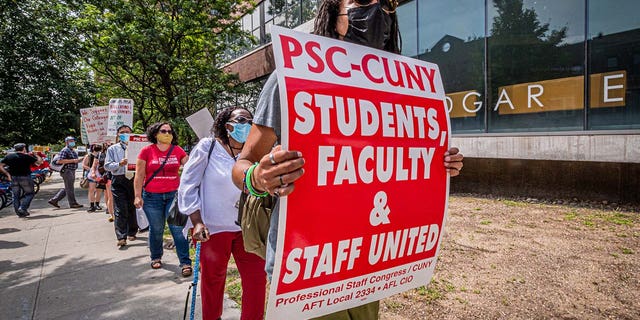 Faculty and staff represented by the Professional Staff Congress (PSC) held a protest in front of Medgar Evers College to call out the college administration for failing to follow its COVID-19 reopening plan and to demand stronger health and safety protocols.