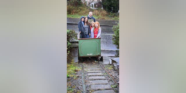The Atkinson family in their funicular railway. It is believed to be one of the smallest funicular railways in the U.K.