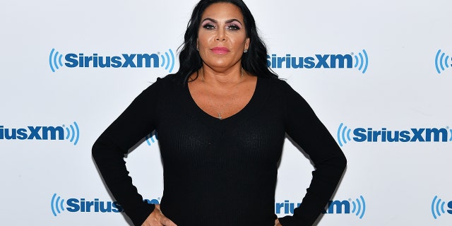In the paparazzi snaps, Graziano, 52, is seen exiting the 123rd precinct in a gray camouflage star-patterned sweatsuit and smoking a cigarette, her long black hair draped over her crew neck.