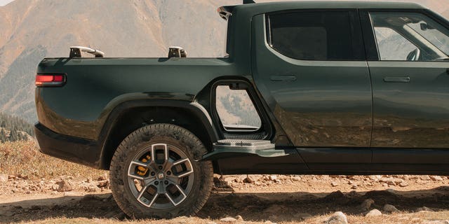 Rivian's Gear Tunnel has doors that double as steps.