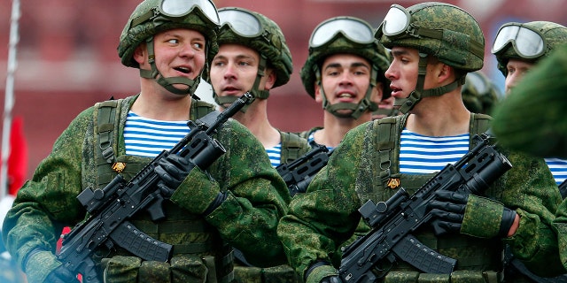 Russian paratroopers march the Victory Day military parade in Red Square marking the 76th anniversary of the end of World War II in Europe in Moscow, May 9, 2021.