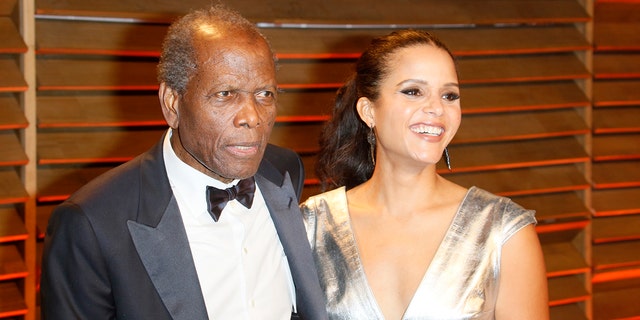 Actor Sidney Poitier and his daughter, actress Sydney Tamiia Poitier, arrive at the Vanity Fair Oscar Party in West Hollywood, Los Angeles, USA, 02 March 2014.