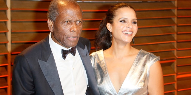 Actor Sidney Poitier and his daughter, actress Sydney Tamiia Poitier, arrive at the Vanity Fair Oscar Party in West Hollywood, Los Angeles, USA, 02 March 2014.