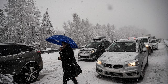 The Red Cross advises against getting out of your car when it's trapped in freezing temperatures.