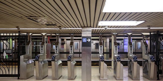 Turnstiles stand empty of commuters at the Bowling Green subway station in New York June 3, 2020. 