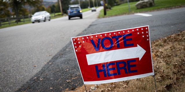 A "Vote Here" sign along the road in Hunterdon County, New Jersey, Nov. 2, 2021. 