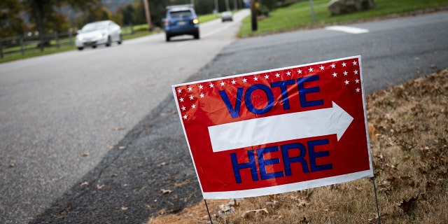 A "Vote Here" sign along the road in Hunterdon County, New Jersey, on Tuesday, Nov. 2, 2021.