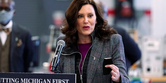 FILE - Michigan Gov. Gretchen Whitmer addresses business leaders, Monday, Dec. 20, 2021, in Detroit. Michigan public schools can use non-teaching staff as substitute teachers the rest of the academic year under a law designed to address a shortage during the coronavirus pandemic. 