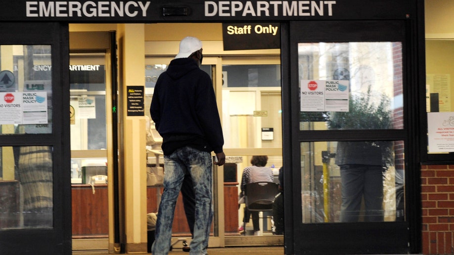 A man enters the emergency room at UAB Hospital in Birmingham, Alabama