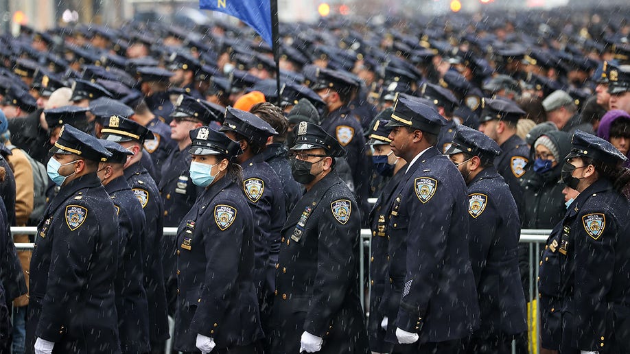 Thousands of NYPD officers attend the funeral of Officer Jason Rivera at St. Patrick's Cathedral