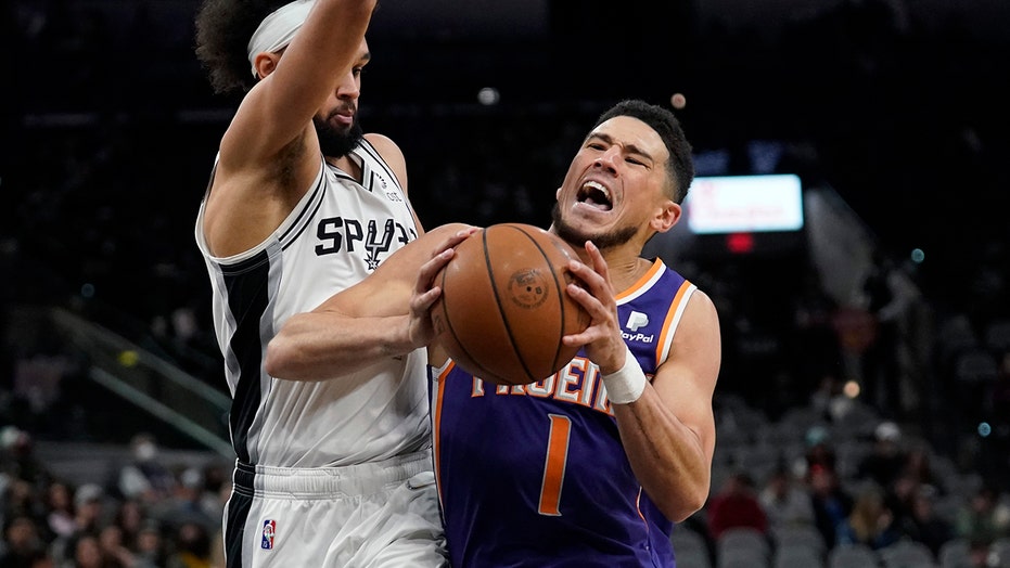 Devin Booker’s season-high 48 points helps Suns rally past Spurs