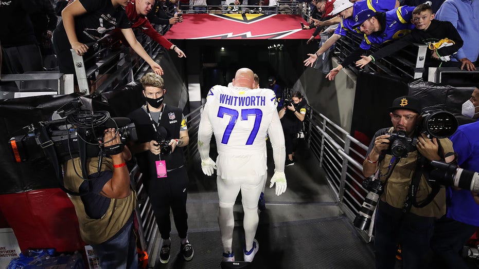 Former Rams OT Andrew Whitworth promises kids 'I'm gonna be home with you guys'