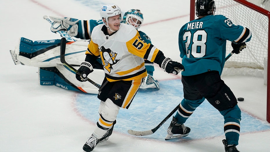 Jake Guentzel's OT goal lifts Penguins over Sharks
