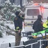 First responders load an empty stretcher into an ambulance at the scene where a bridge collapsed, Friday Jan. 28, 2022, in Pittsburgh's East End. 