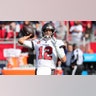 Tampa Bay Buccaneers Quarterback Tom Brady (12) warms up before the NFC Divisional game between the Los Angeles Rams and the Tampa Bay Buccaneers on January 23, 2022 at Raymond James Stadium in Tampa, Florida.