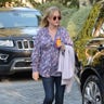 Kathy Hilton looked chic drinking a poppi prebiotic soda while taking a break from shooting "The Real Housewives of Beverly Hills" in Beverly Hills, Calif. on Jan. 17.