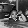  American civil rights leader Martin Luther King Jr. waves with his children Yolanda and Martin Luther III from the Magic Skyway ride at the Worlds Fair, New York City on Aug. 12, 1964. 