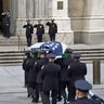 A casket carrying the body of NYPD Officer Jason Rivera body arrives at St. Patrick's Cathedral.