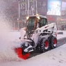 A plow clears snow in Times Square during a Nor'easter storm in Manhattan, New York City, U.S., January 29, 2022.