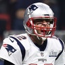 Tom Brady #12 of the New England Patriots celebrates his teams fourth quarter touchdown against the Los Angeles Rams during Super Bowl LIII at Mercedes-Benz Stadium on February 03, 2019 in Atlanta, Georgia.